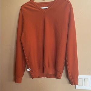 Calvin Klein Men's V-Neck Sweater in Fashionable Rust color. 83% Cotton.